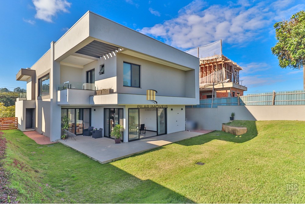 Casa de Condomínio 5 dormitórios no bairro Vila Nova