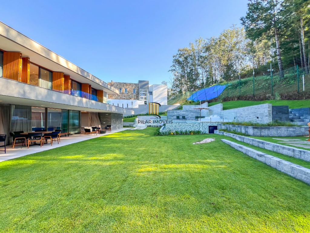 Casa de Condomínio 4 dormitórios no bairro Vila Nova
