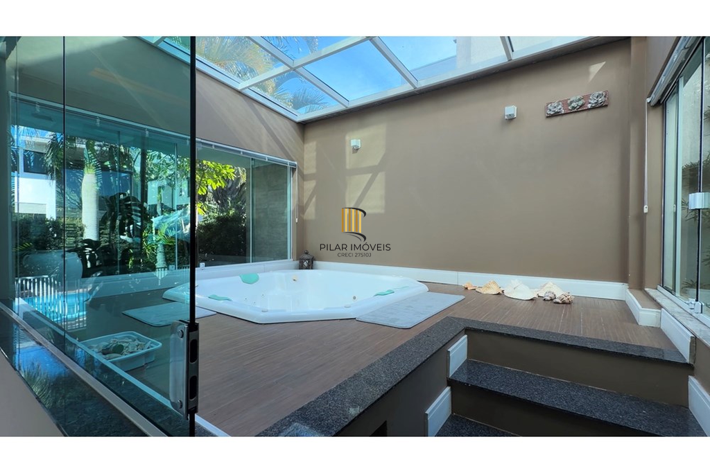 Casa de Condomínio 4 dormitórios no bairro Morada do Sol