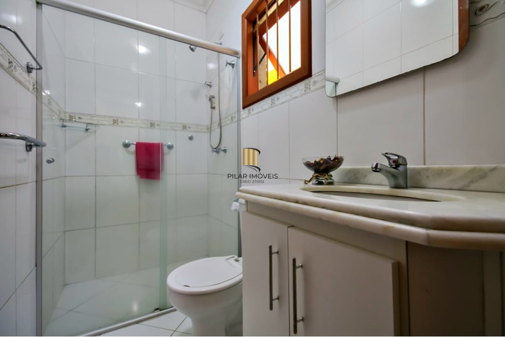 Casa 3 dormitórios no bairro Guarujá