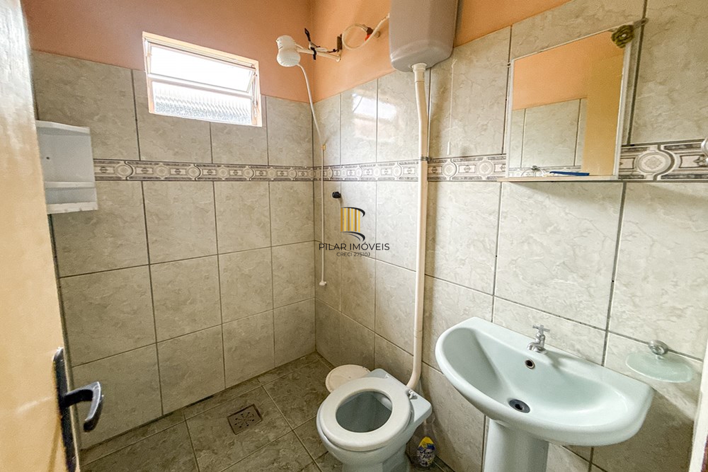 Casa 3 dormitórios no bairro Igara