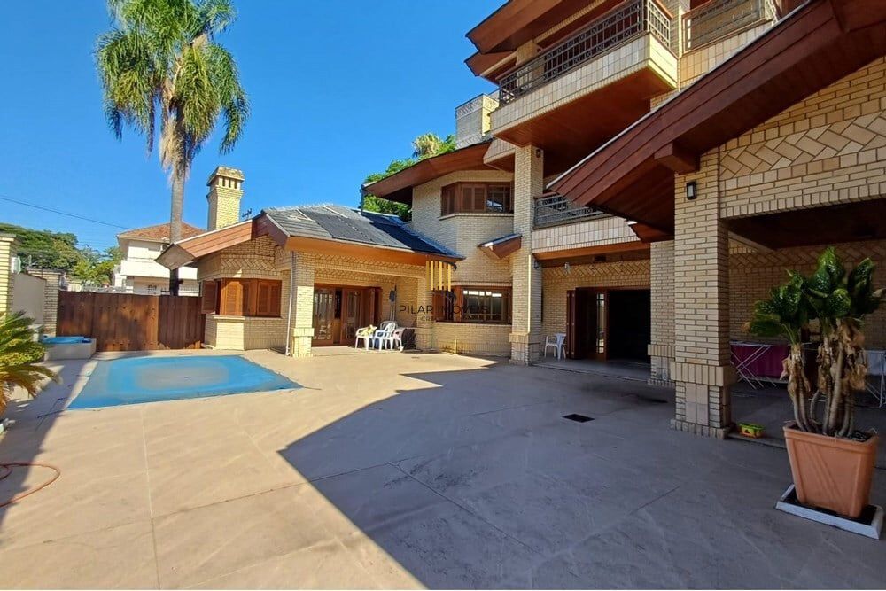 Casa 4 dormitórios no bairro Partenon