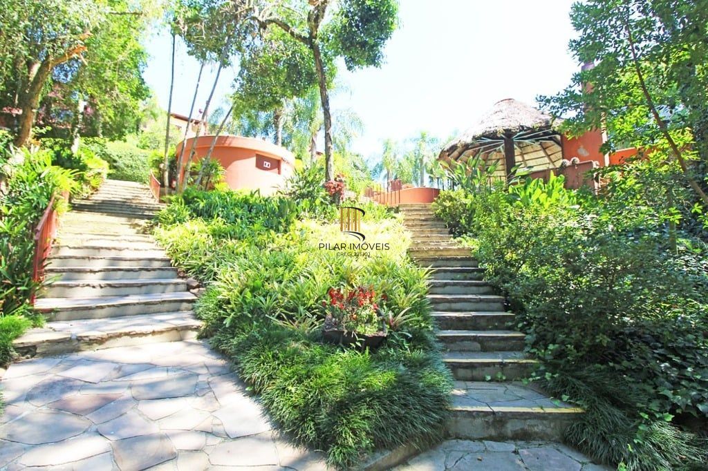 Casa de Condomínio 4 dormitórios no bairro Santa Tereza