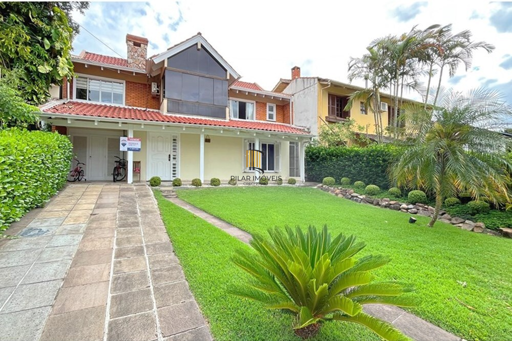 Casa de Condomínio 5 dormitórios no bairro Cavalhada