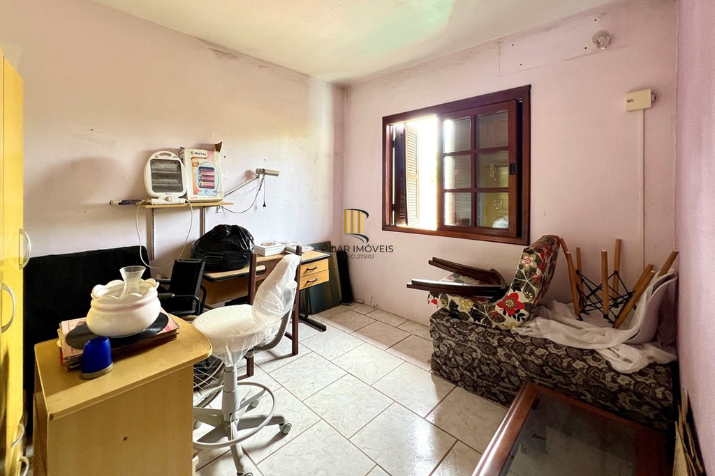 Casa 4 dormitórios no bairro Igara