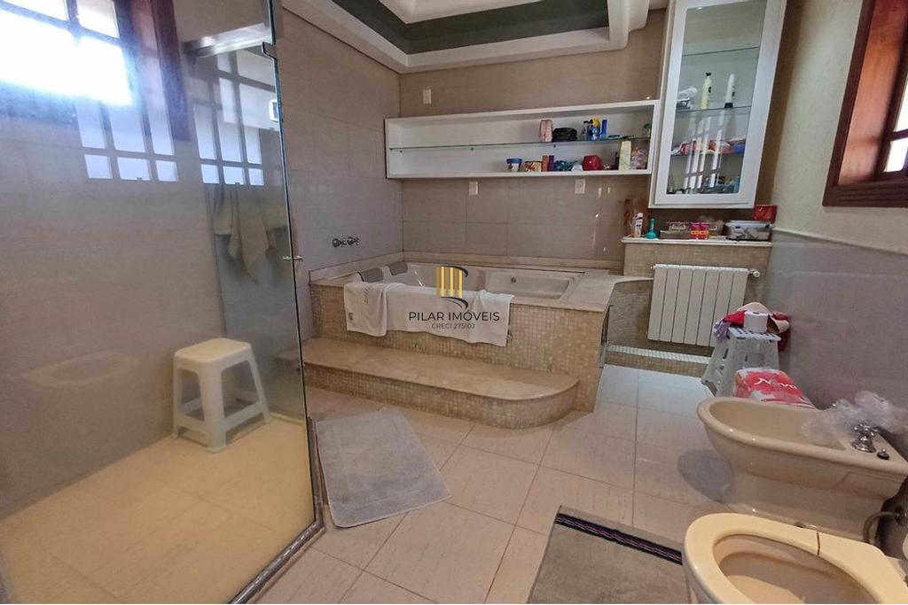 Casa 4 dormitórios no bairro Partenon