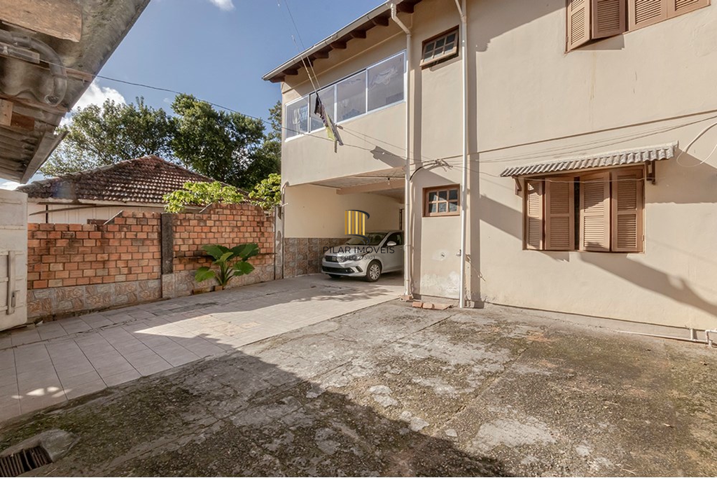 Casa 5 dormitórios no bairro Glória