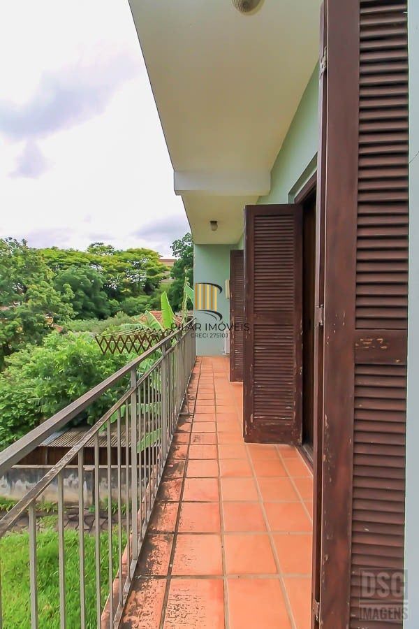 Casa 3 dormitórios no bairro Glória