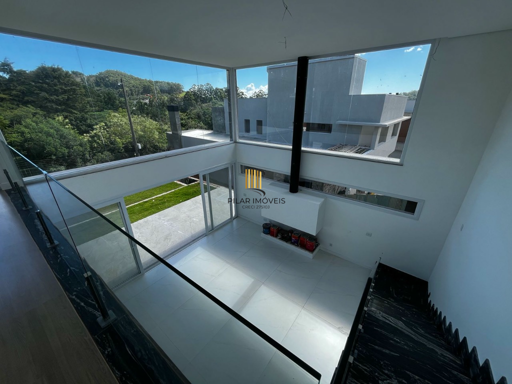 Casa de Condomínio 4 dormitórios no bairro Vila Nova