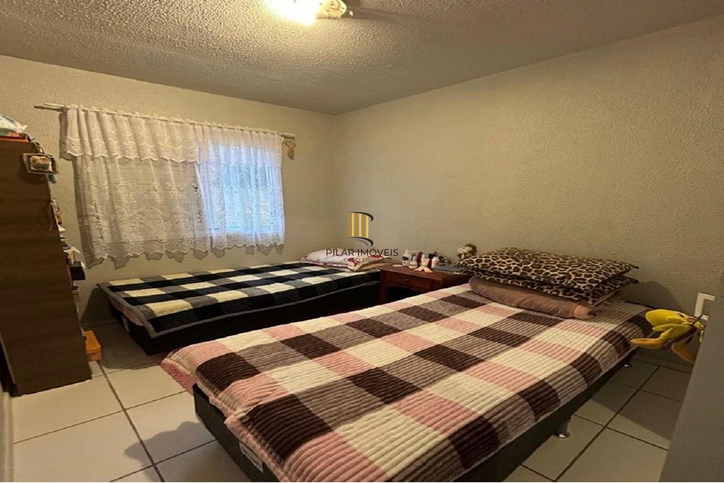 Casa de Condomínio 2 dormitórios no bairro Jardim Algarve
