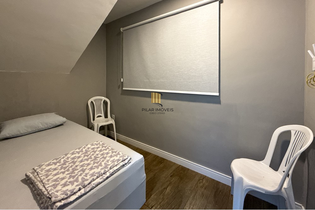 Casa 5 dormitórios no bairro Igara