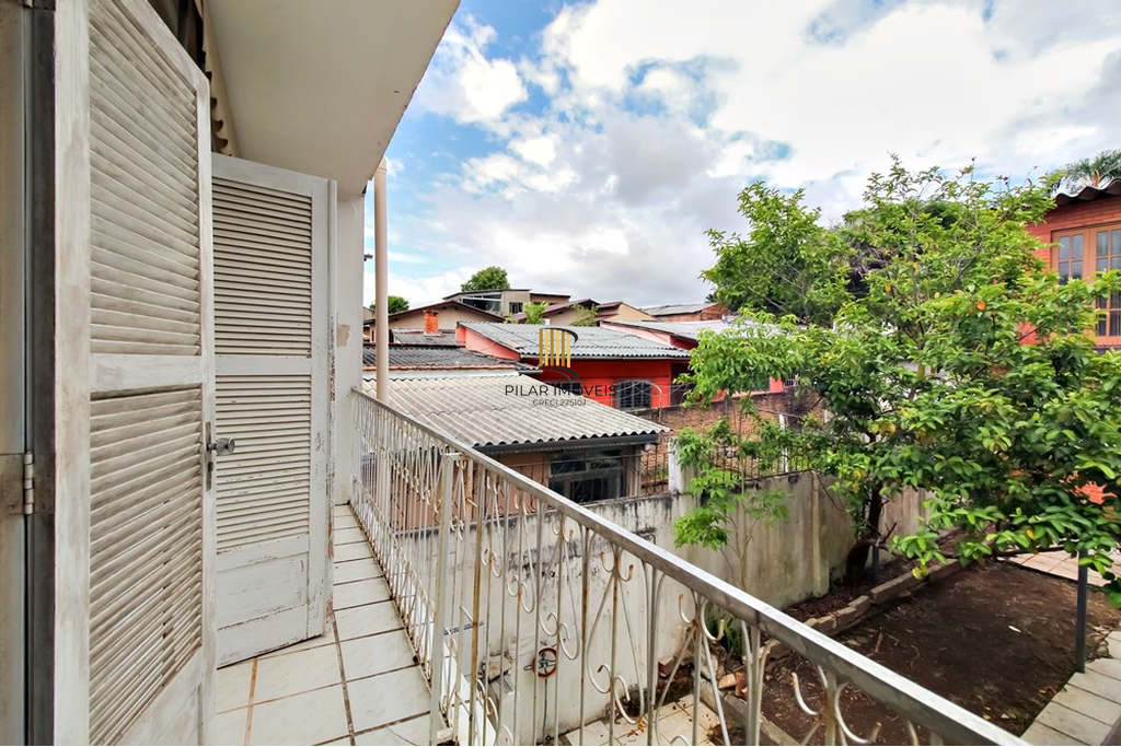 Casa 4 dormitórios no bairro Glória