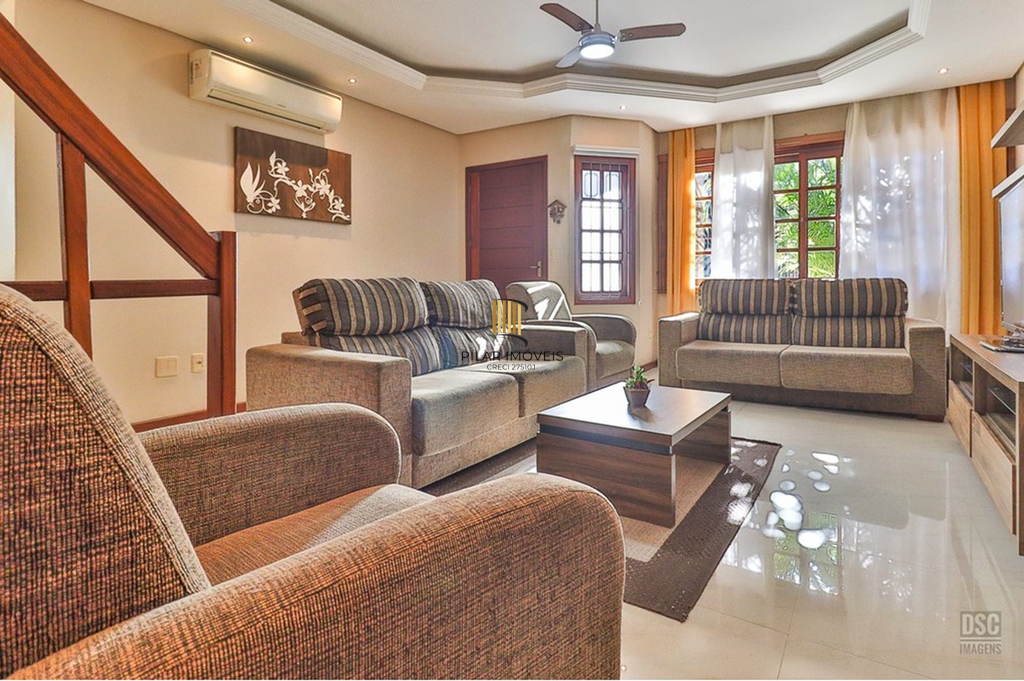 Casa 5 dormitórios no bairro Ipanema