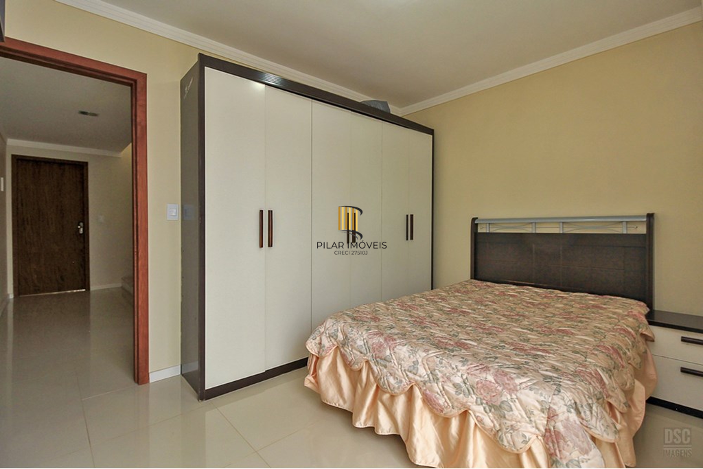 Casa 3 dormitórios no bairro Guarujá