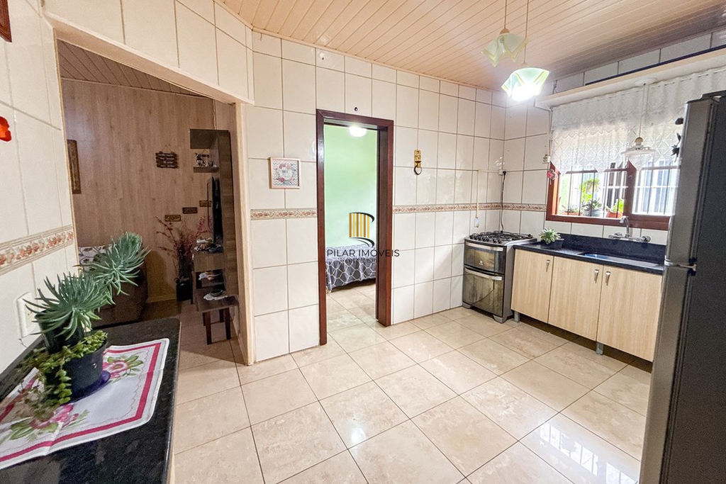 Casa 3 dormitórios no bairro Igara