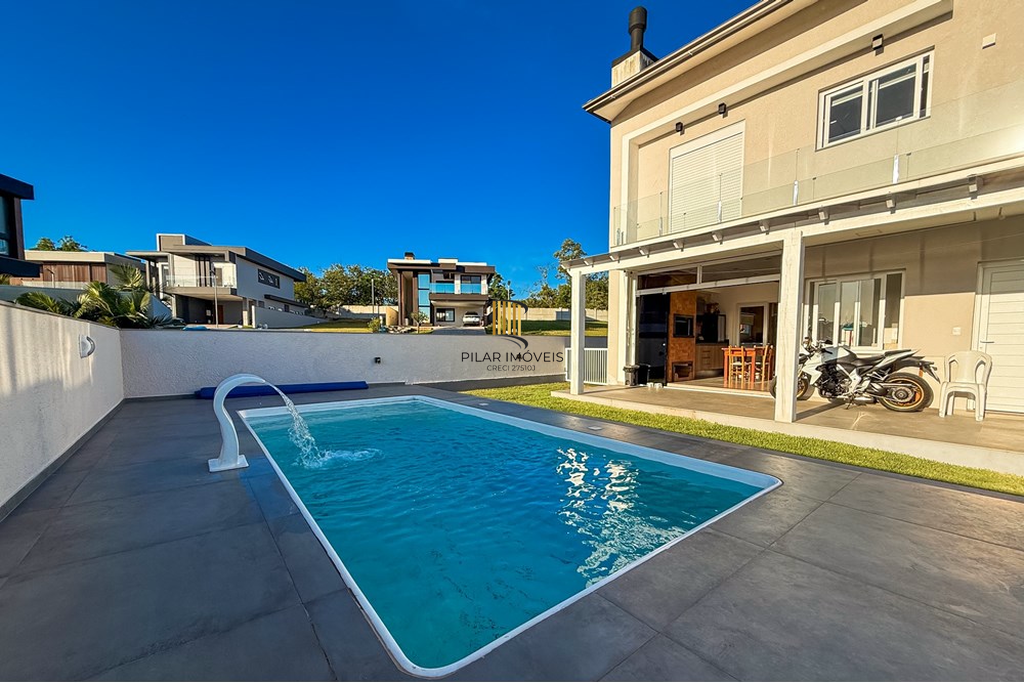 Casa de Condomínio 3 dormitórios no bairro Sanga Funda