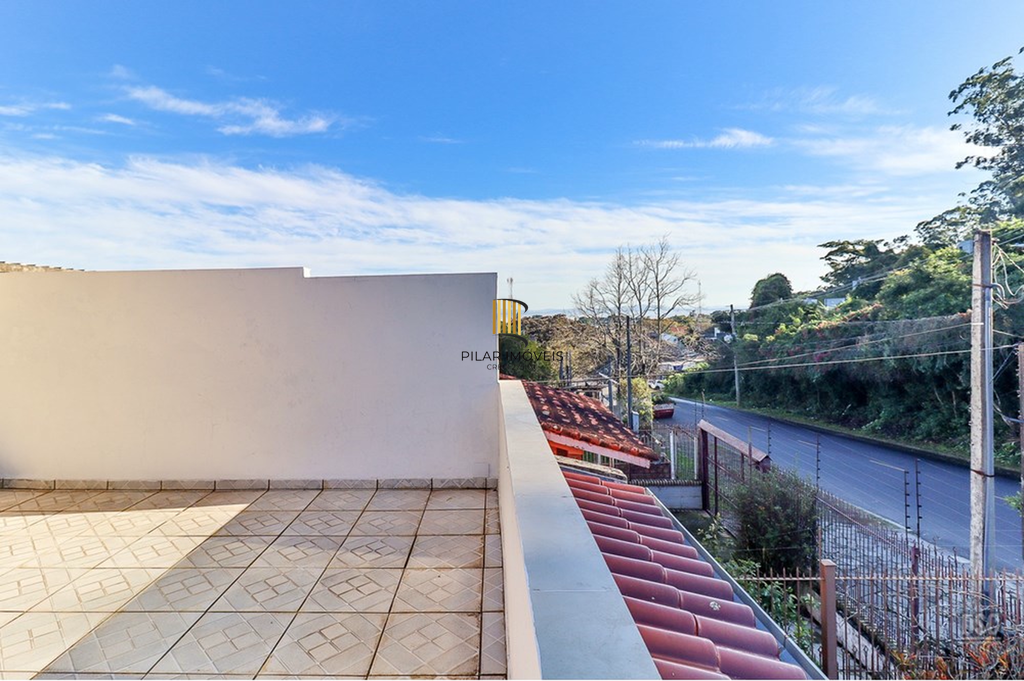Casa 5 dormitórios no bairro Ipanema