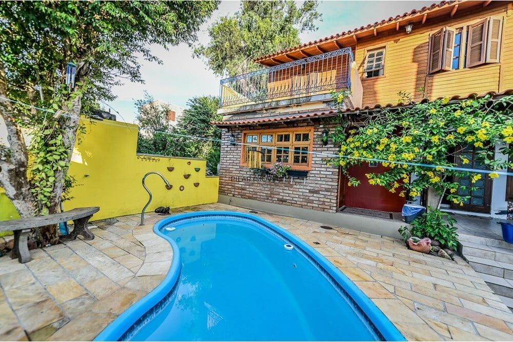 Casa de Condomínio 4 dormitórios no bairro Santa Tereza