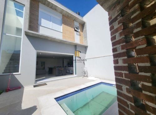 Casa de Condomínio 3 dormitórios no bairro Passo das Pedras