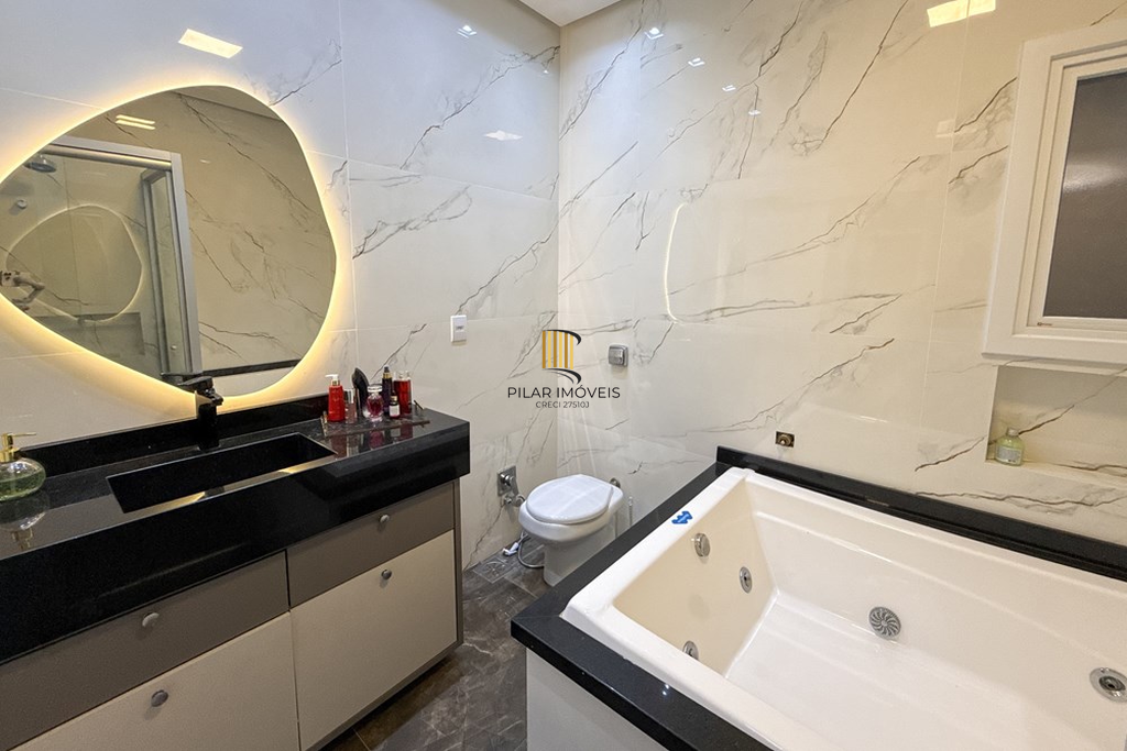 Casa 3 dormitórios no bairro Igara