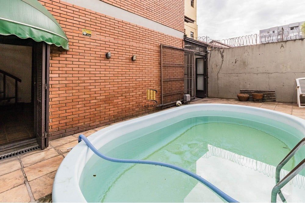 Casa 3 dormitórios no bairro Partenon
