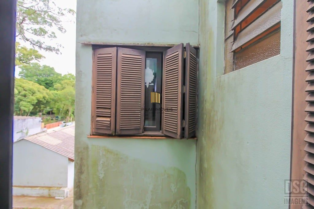 Casa 3 dormitórios no bairro Glória