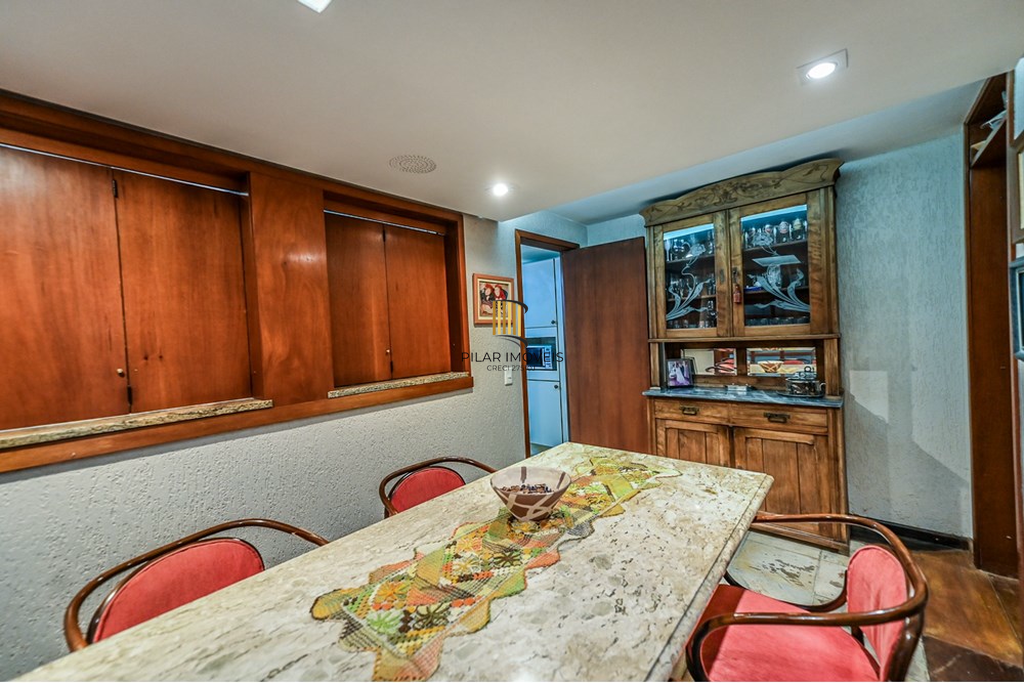 Casa de Condomínio 4 dormitórios no bairro Três Figueiras