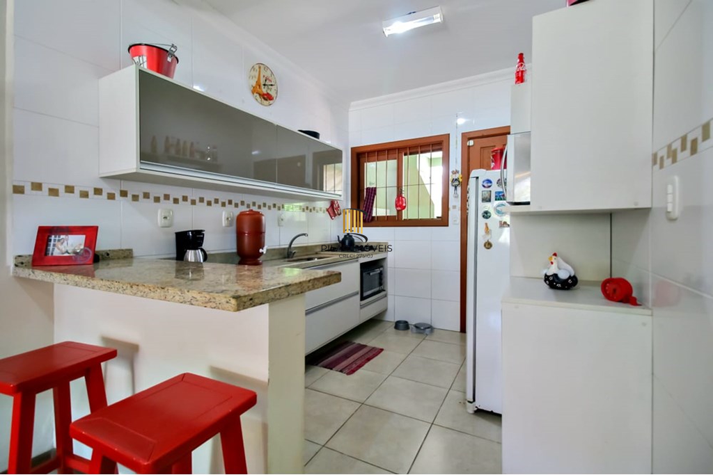 Casa 3 dormitórios no bairro Guarujá