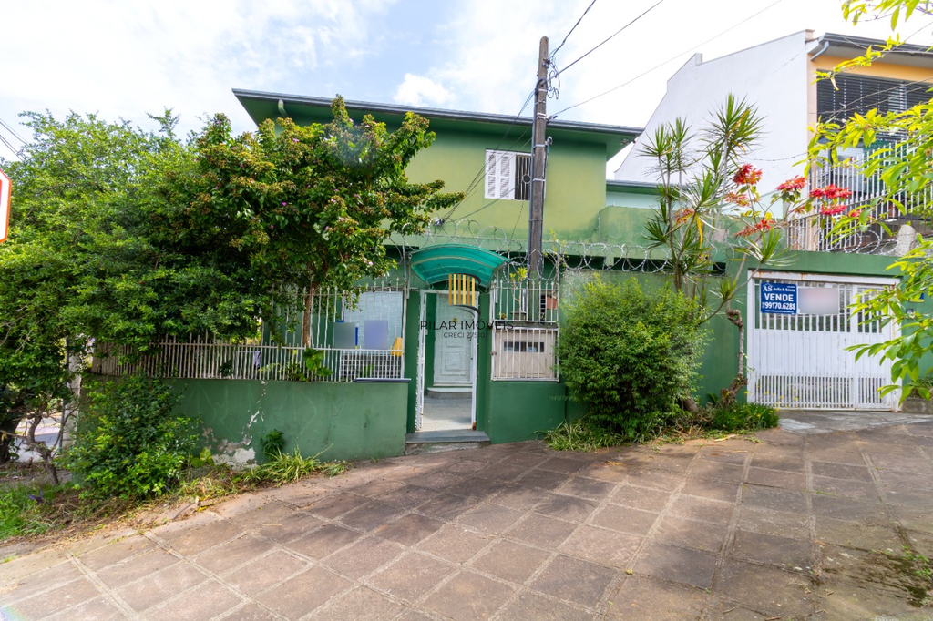 Casa 5 dormitórios no bairro Petrópolis