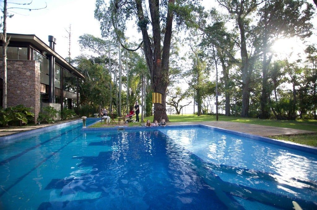 Casa de Condomínio 5 dormitórios no bairro Pedra Redonda