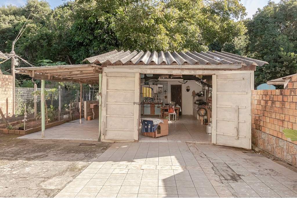 Casa 5 dormitórios no bairro Glória