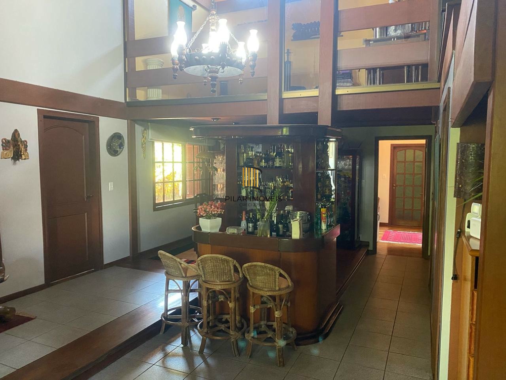 Casa 5 dormitórios no bairro Chácara das Pedras