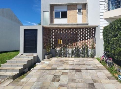 Casa de Condomínio 3 dormitórios no bairro Passo das Pedras