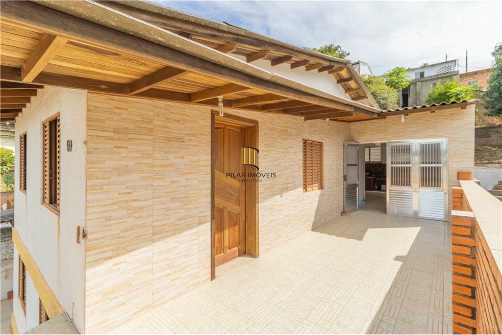 Casa 5 dormitórios no bairro Partenon