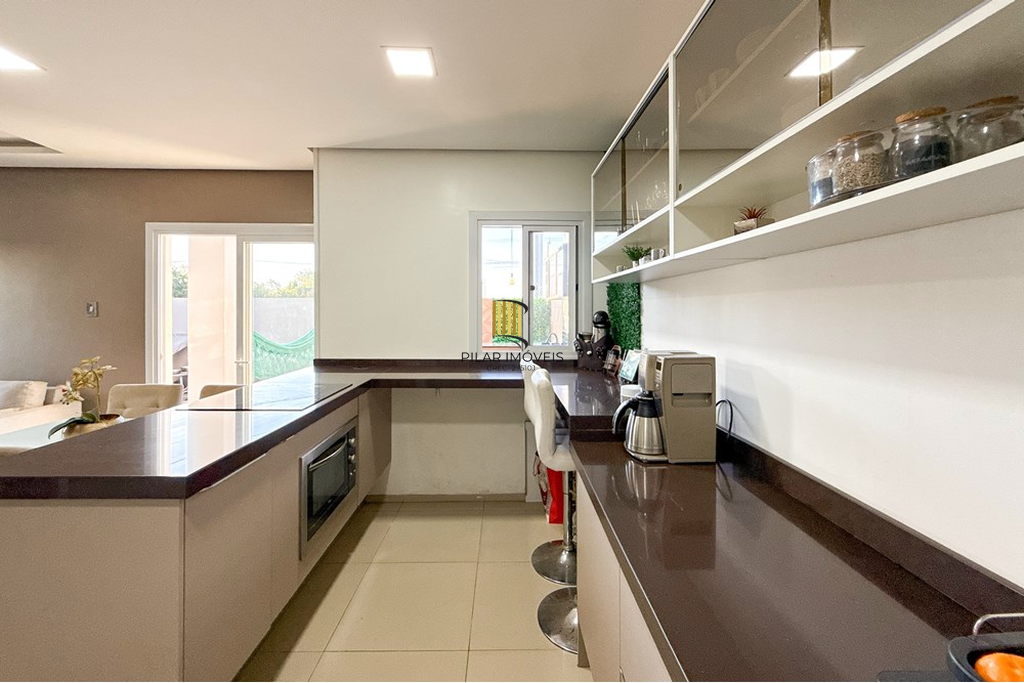 Casa 3 dormitórios no bairro Igara