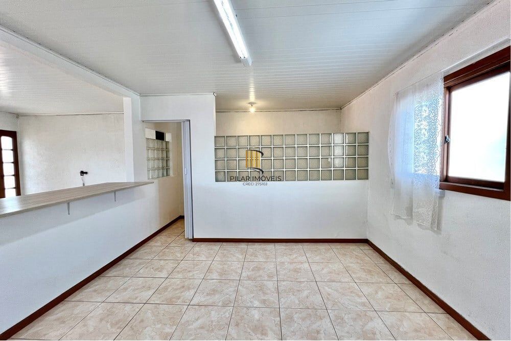 Casa 5 dormitórios no bairro Igara
