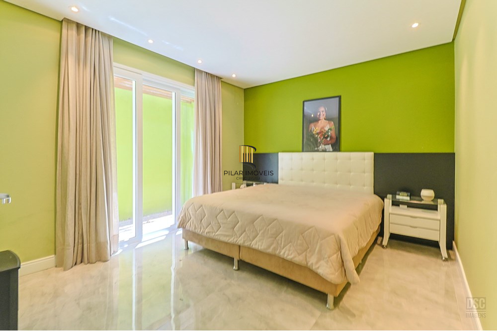 Casa 5 dormitórios no bairro Ipanema