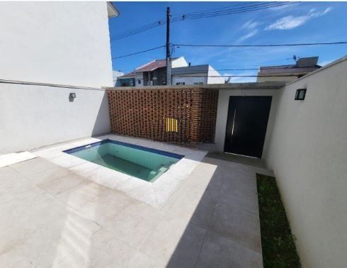 Casa de Condomínio 3 dormitórios no bairro Passo das Pedras