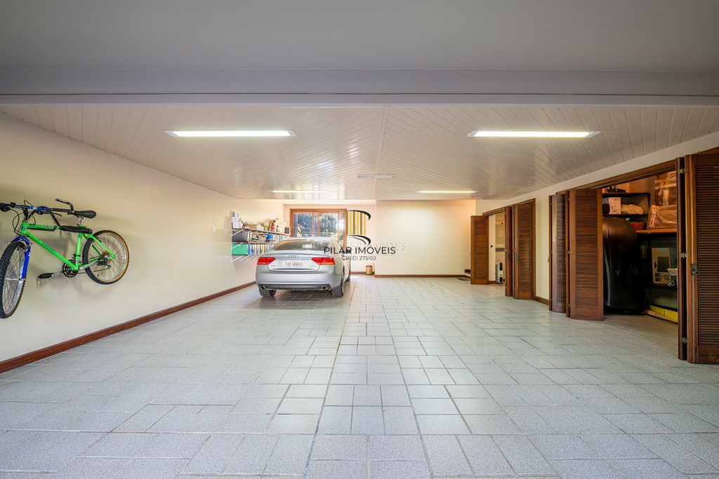 Casa de Condomínio 3 dormitórios no bairro Cavalhada