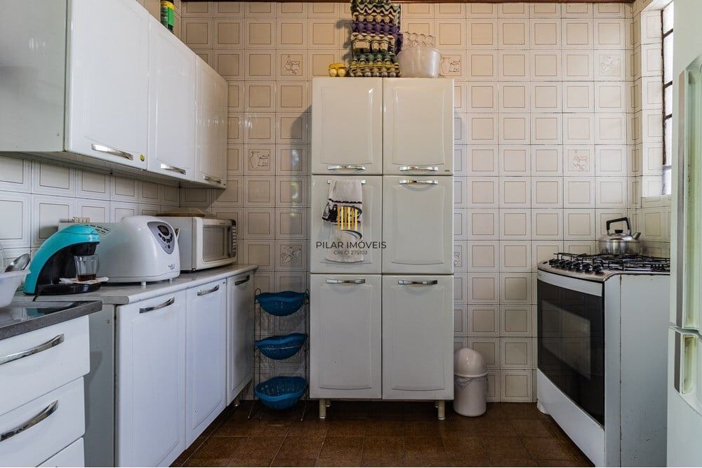 Casa 3 dormitórios no bairro Partenon