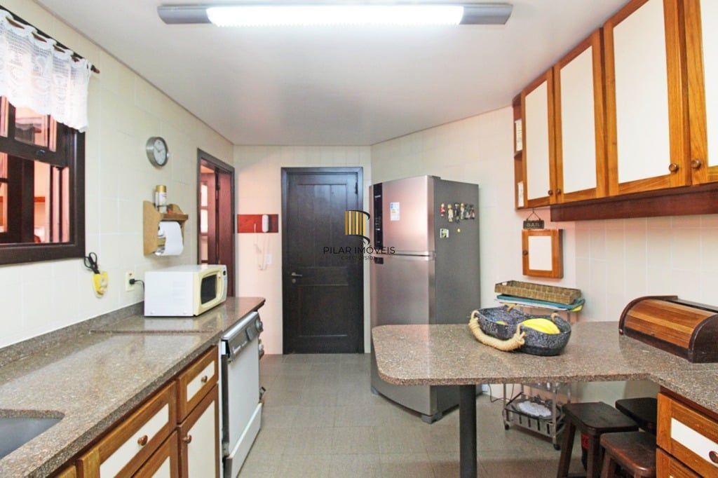 Casa de Condomínio 4 dormitórios no bairro Santa Tereza