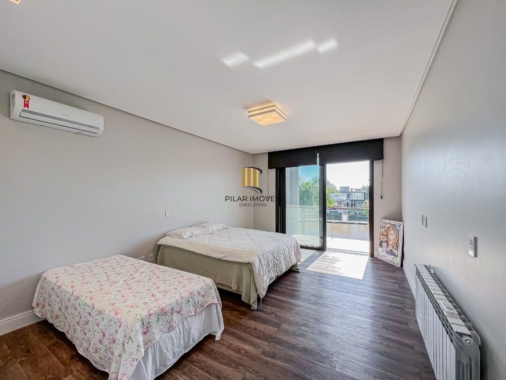 Casa de Condomínio 5 dormitórios no bairro Ponta da Figueira