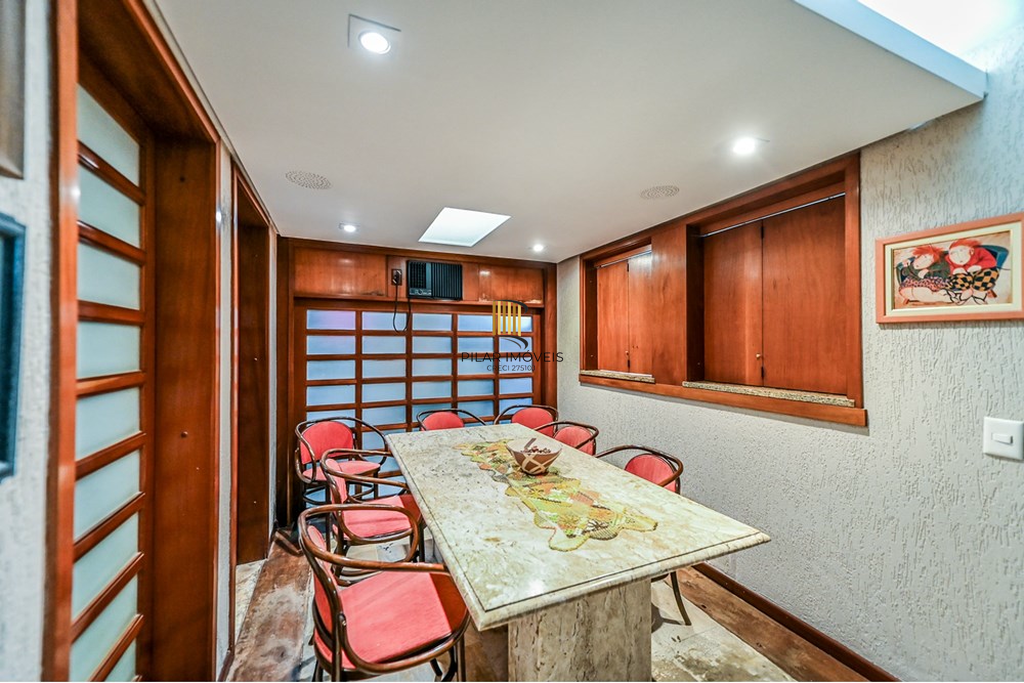 Casa de Condomínio 4 dormitórios no bairro Três Figueiras