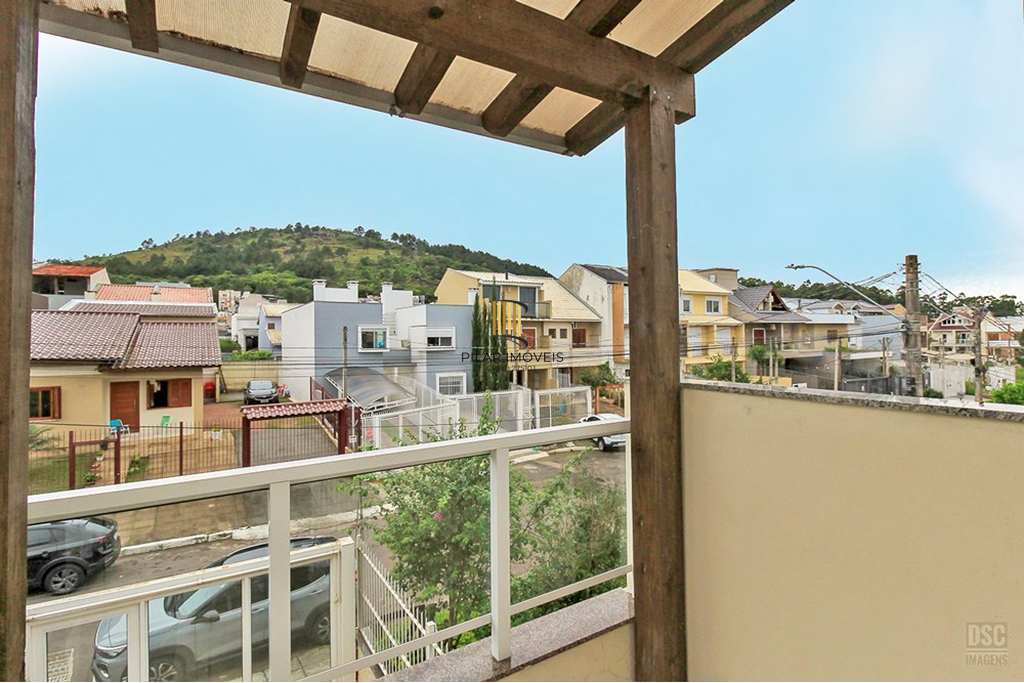 Casa 3 dormitórios no bairro Guarujá