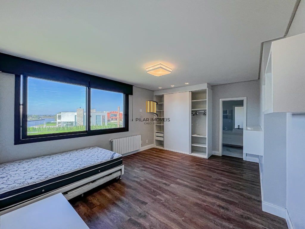 Casa de Condomínio 5 dormitórios no bairro Ponta da Figueira