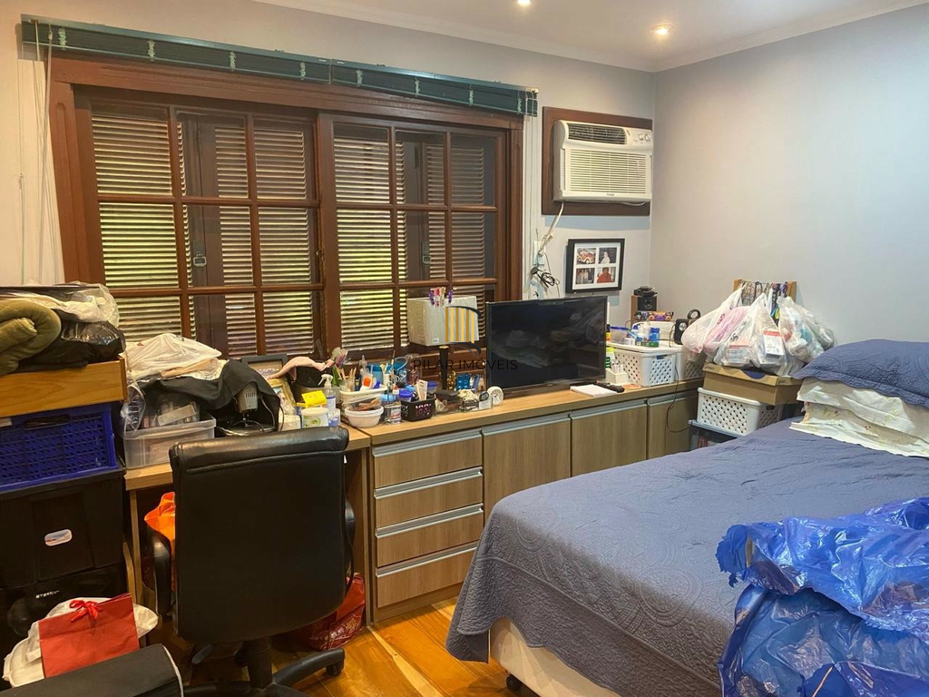 Casa 5 dormitórios no bairro Chácara das Pedras