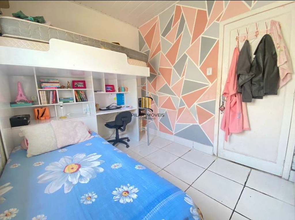 Casa 5 dormitórios no bairro Camaquã