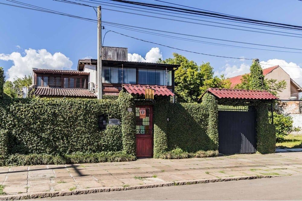 Casa 3 dormitórios no bairro Guarujá - Pilar Imóveis