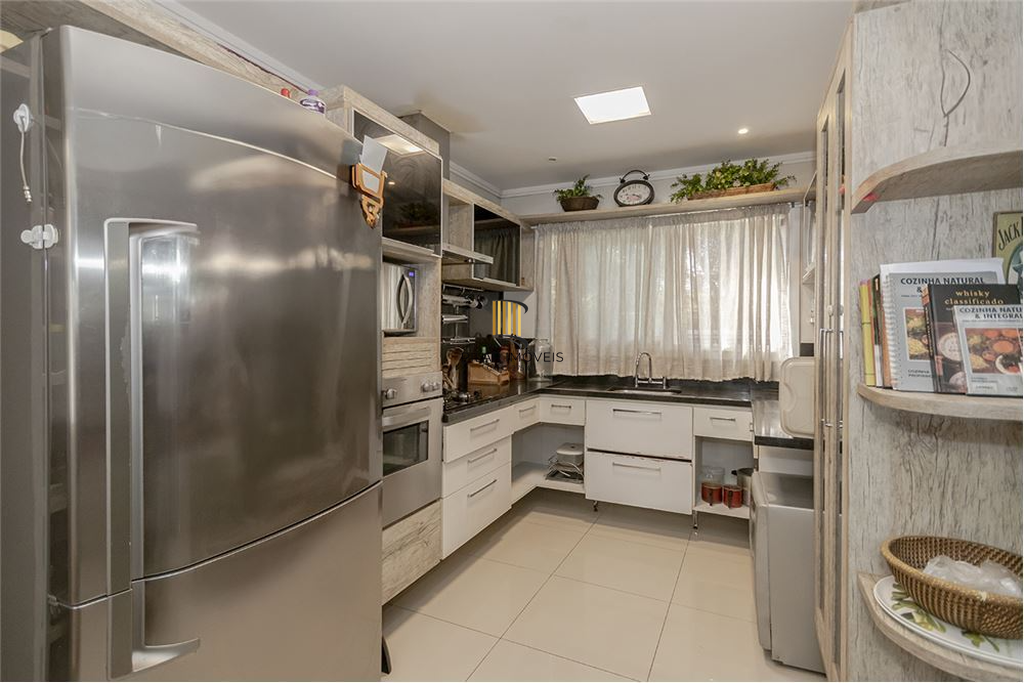 Casa 4 dormitórios no bairro Vila Assunção
