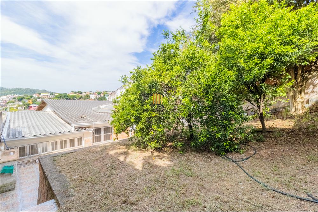 Casa 5 dormitórios no bairro Partenon